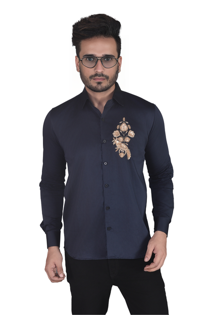 BIRD BEAUTIFULLY EMBROIDERED ON A SHIRT